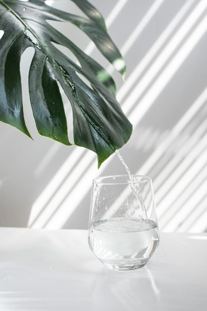 water running into glass